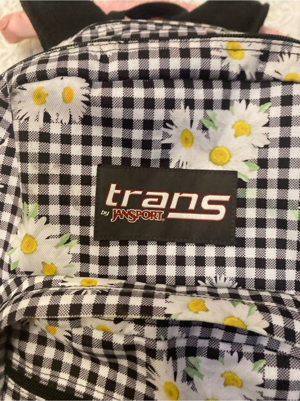 TRANS by JANSPORT Checkerboard With Daisies Charm Loaded Backpack